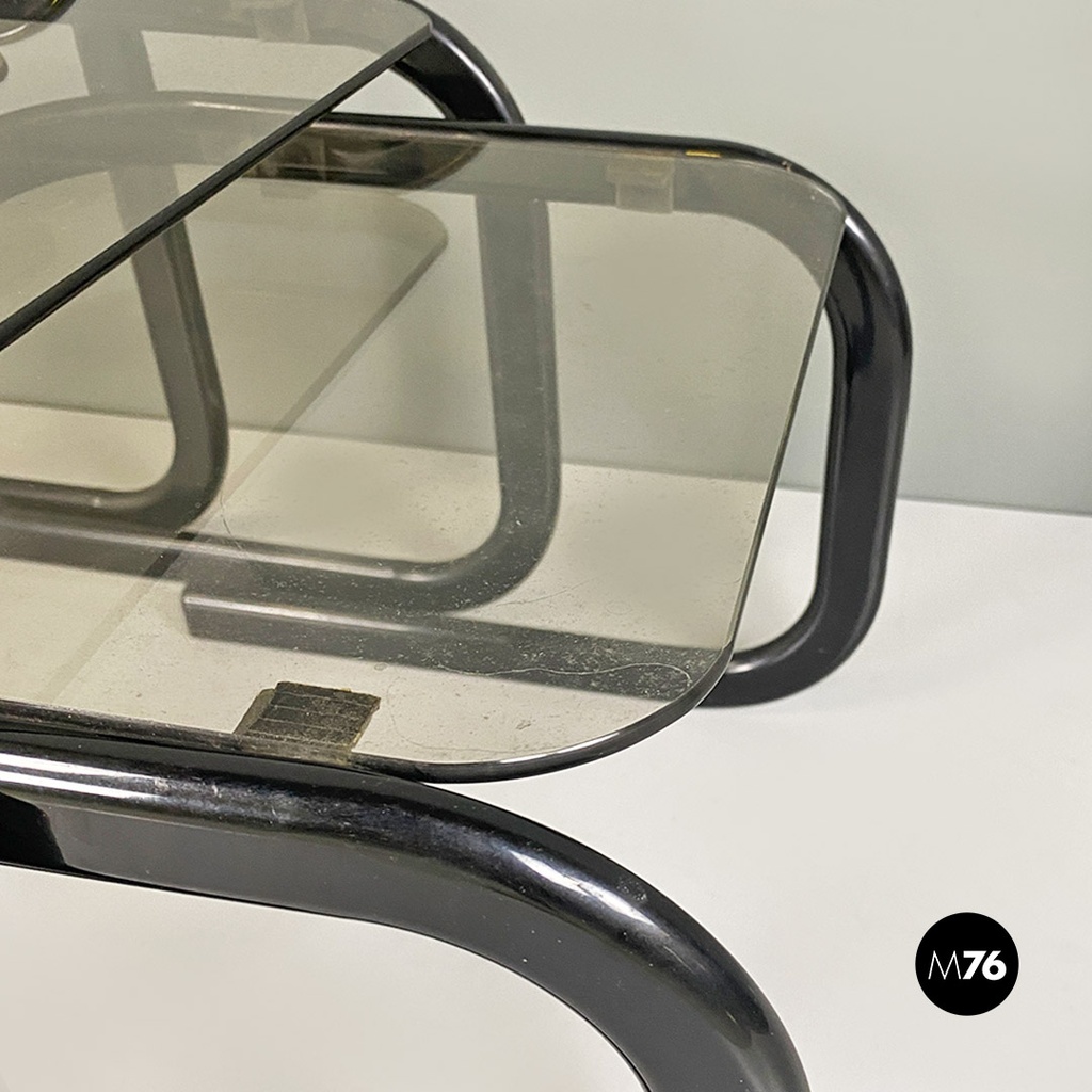 Tris di tavoli in vetro fumè e metallo nero, 1980 ca.