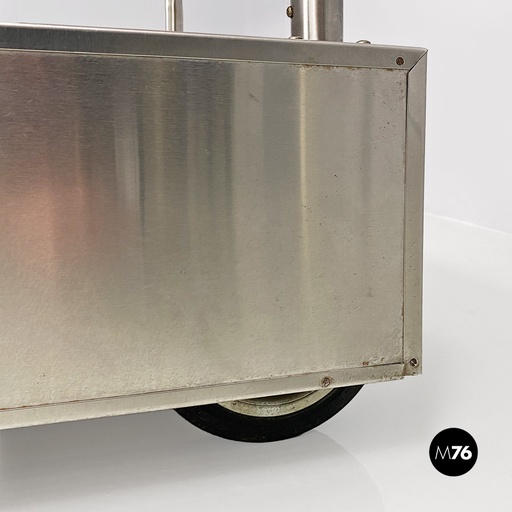 [2220001121] Espositore su ruote, 1980 ca.